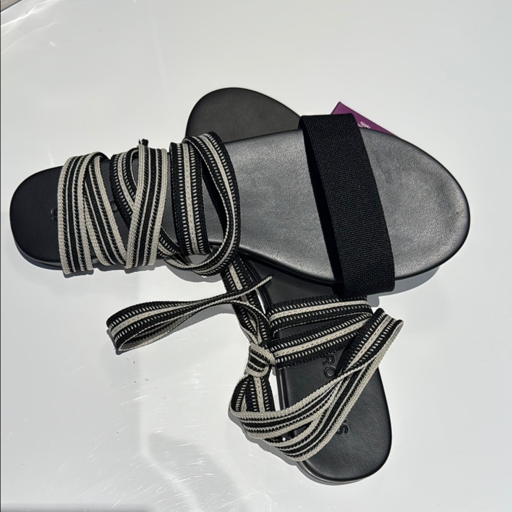 Rothy’s Stylish Black and Cream Tie Sandals